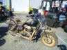Harley Davidson Fatboy Motorcycle that has sustained flood damage.